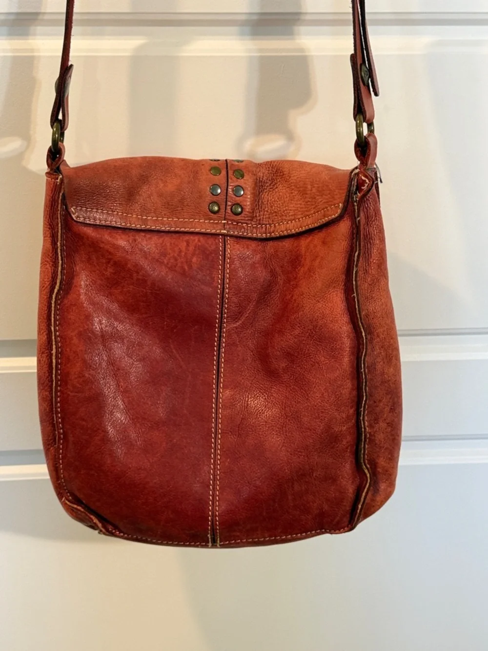 Patricia Nash Armeno Flap Crossbody Messenger Bag, Studs, Berry Red Leather